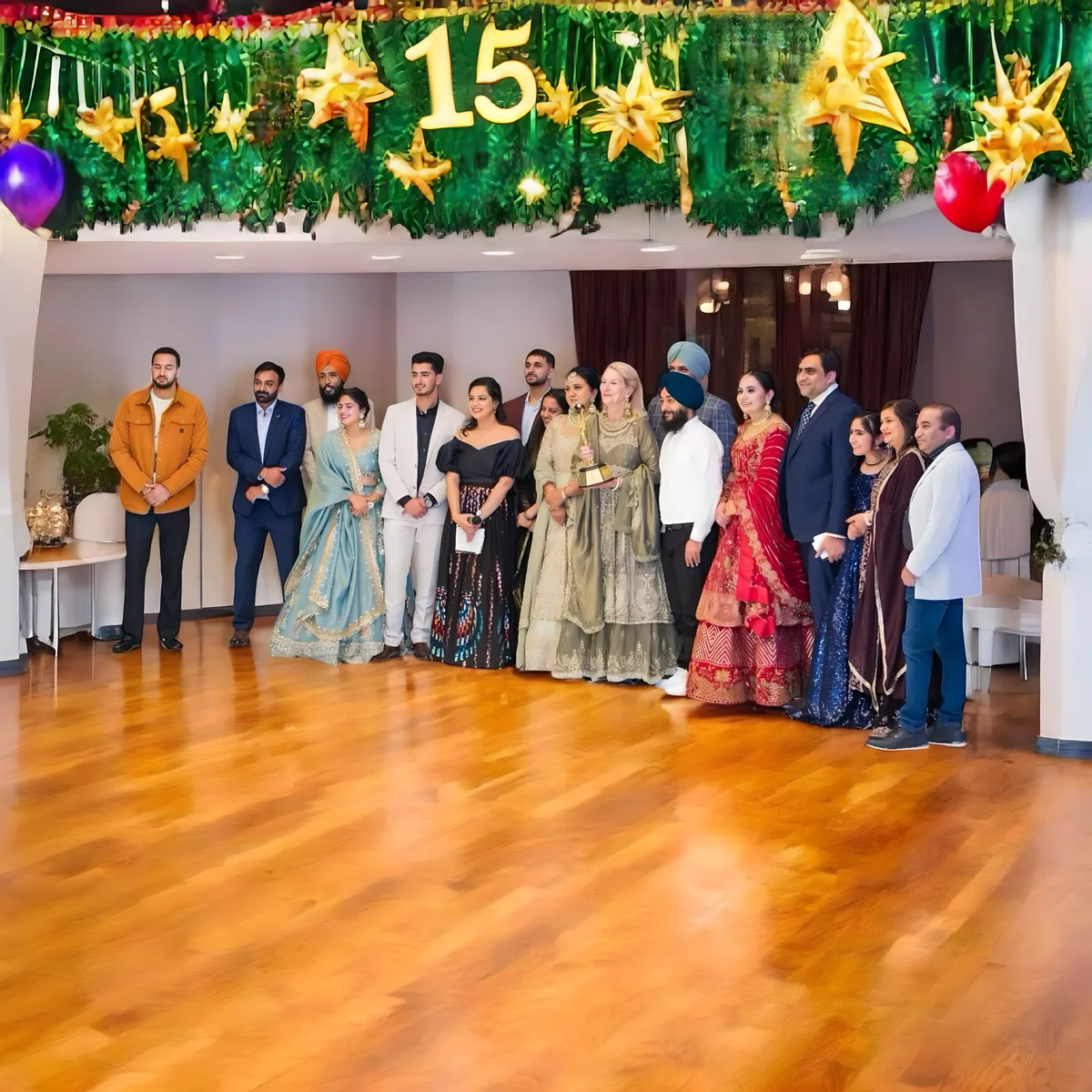 Sukh Sandhu with the team — photograph 3