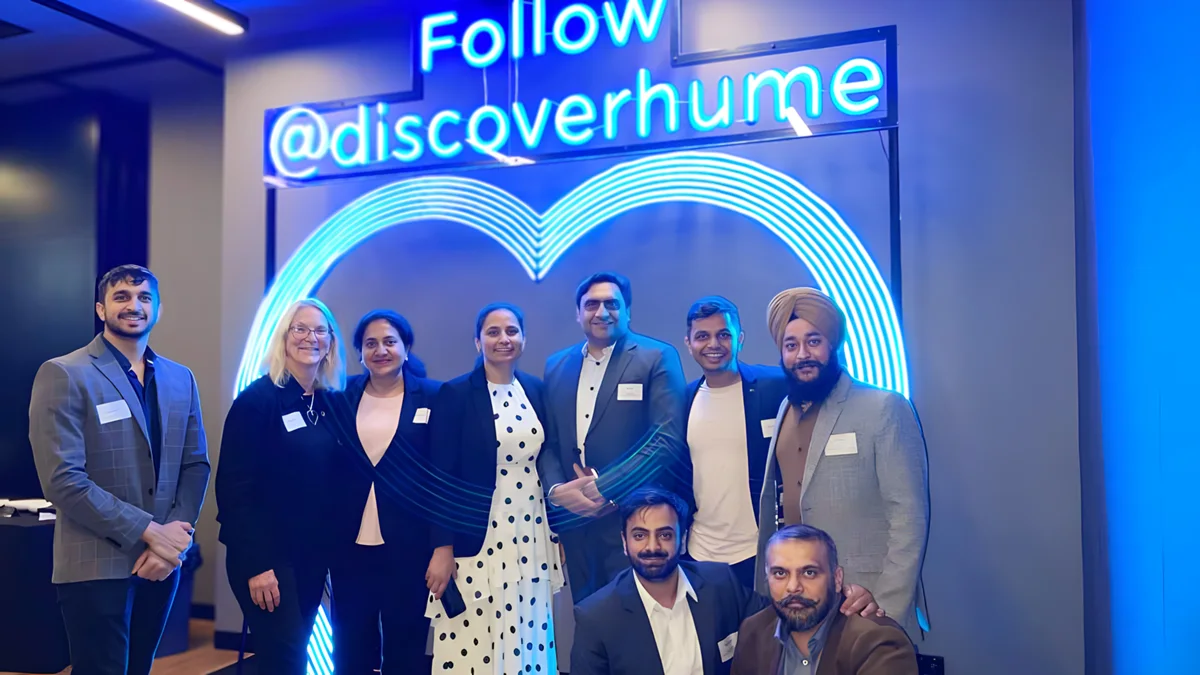 Sukh Sandhu with the team — photograph 19