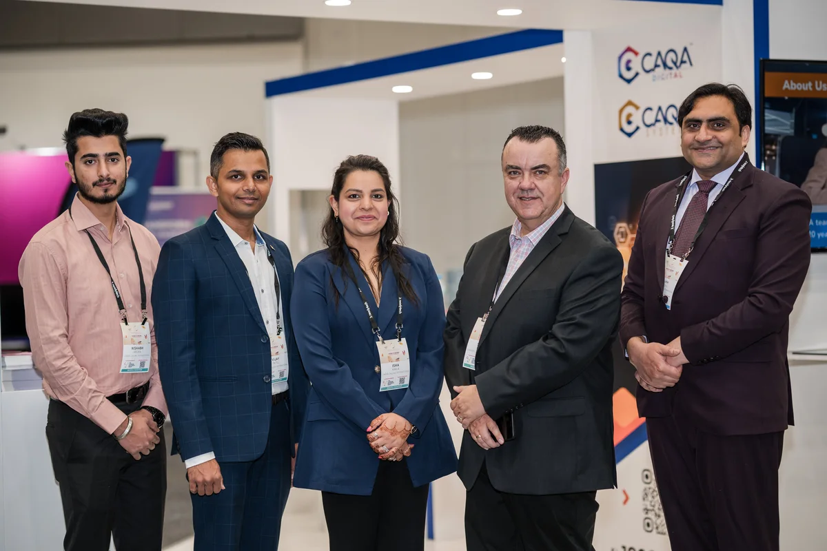 Sukh Sandhu with the team — photograph 24