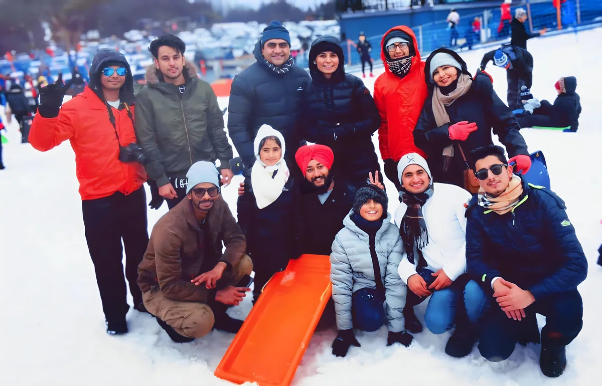 Sukh Sandhu with the team — photograph 33